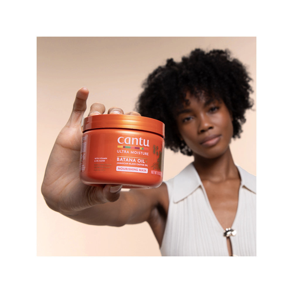 Model presenting Cantu Ultra Moisture Nourishing Mask