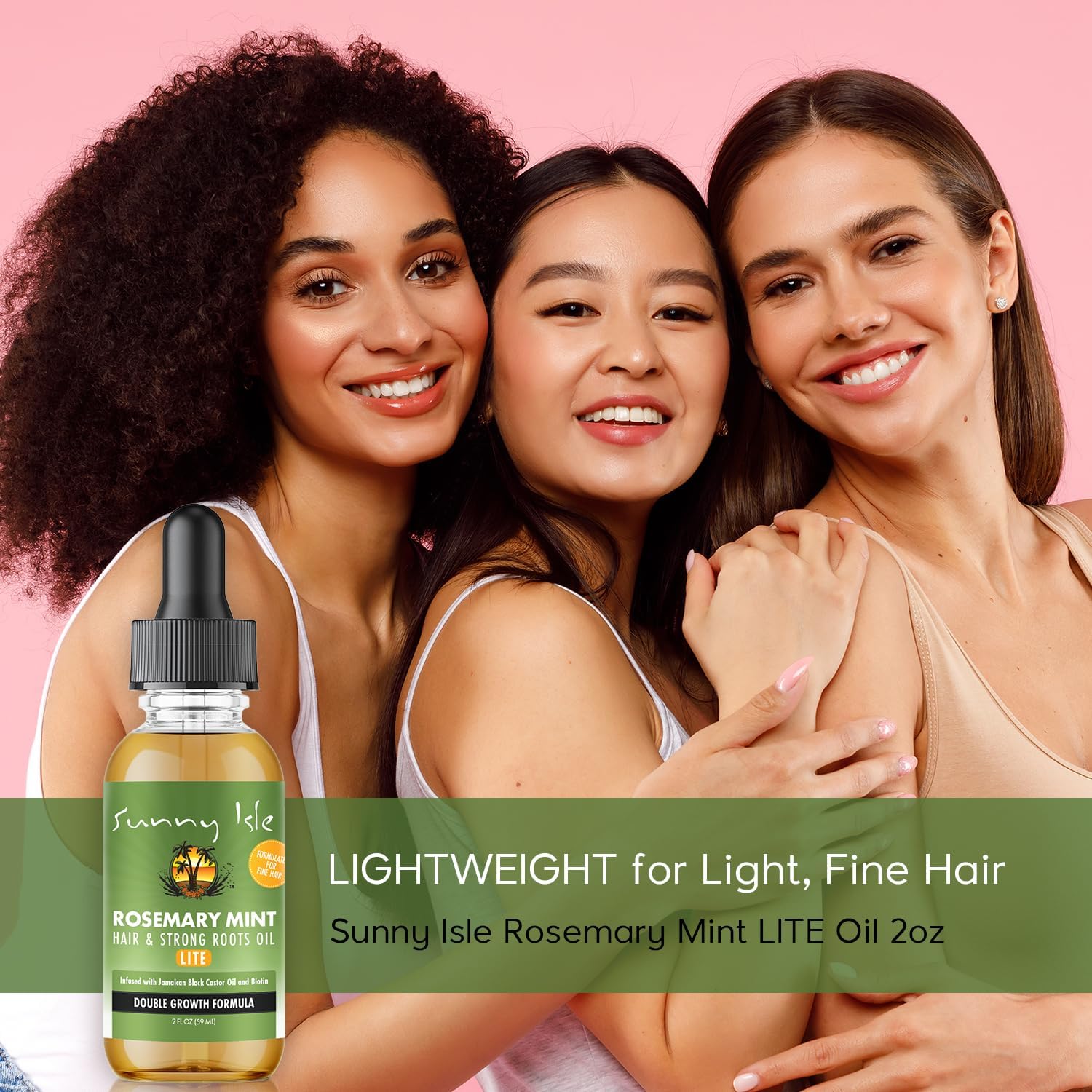 Three women with a bottle of Sunny Isle Rosemary Mint LITE Oil 