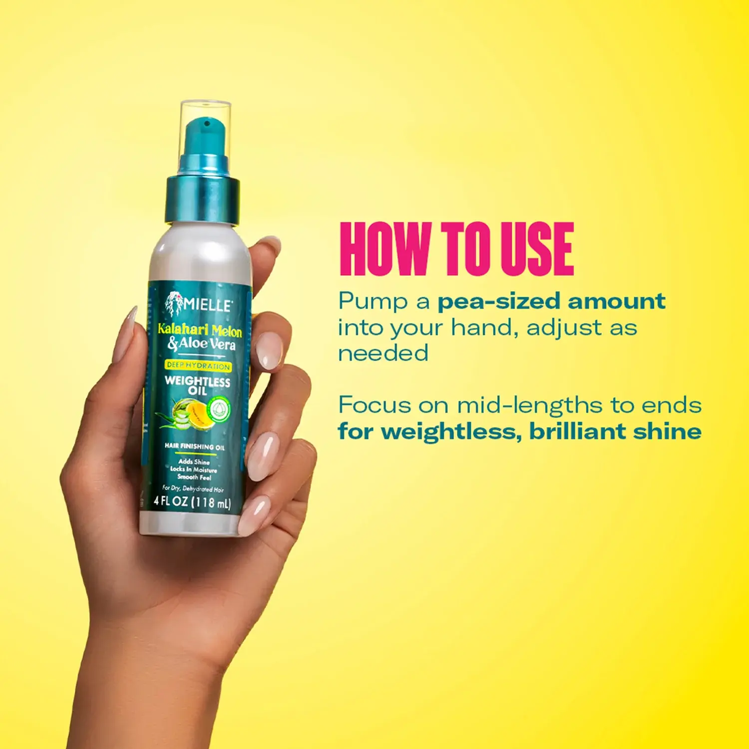 Hand holding Mielle Weightless Oil 118ml with application directions