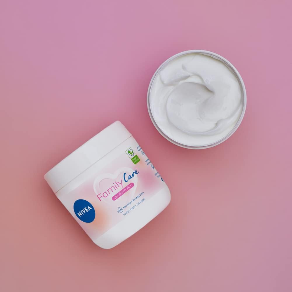 Nivea Family Care Sensitive jar beside visible white cream texture