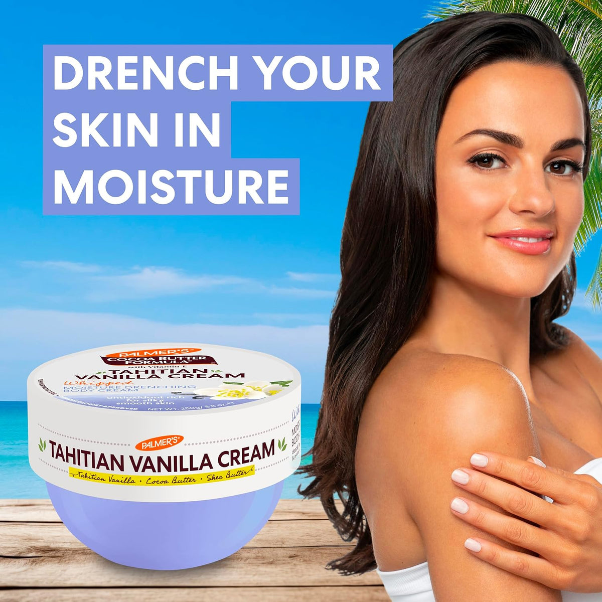 Smiling woman holding her shoulder beside the Palmer's Tahitian Vanilla Cream tub on a beach-style background with a drench your skin in moisture headline