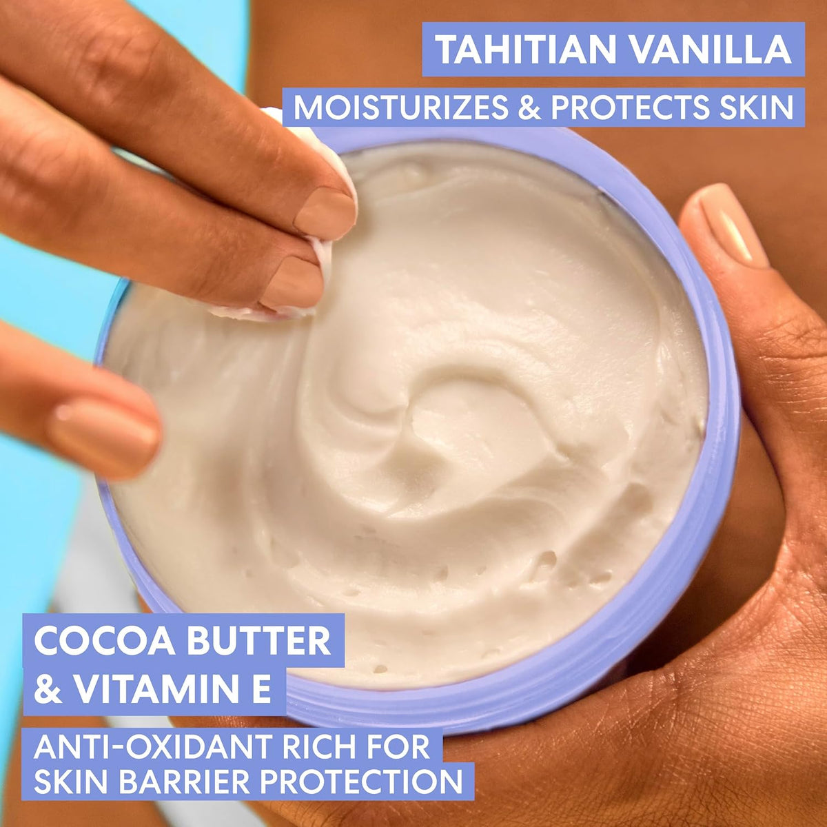 Fingers scooping whipped cream from an open lilac tub with Tahitian vanilla and cocoa butter and vitamin E callouts